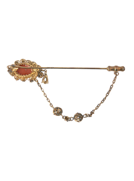 Elegant Dolce & Gabbana brooch with crystal chain