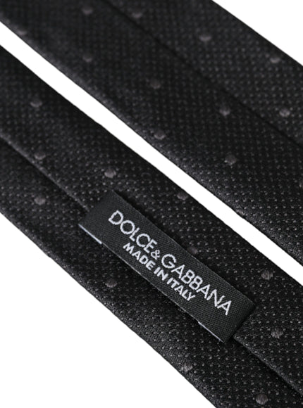 Dolce & Gabbana label on black silk tie