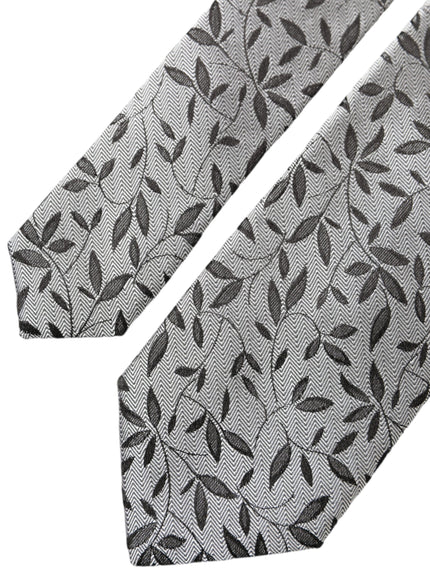 Detailed view of gray leaves design on tie