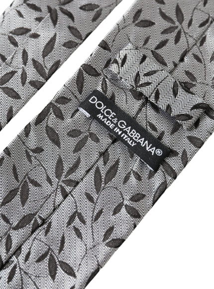 Dolce & Gabbana label on gray leaves silk tie