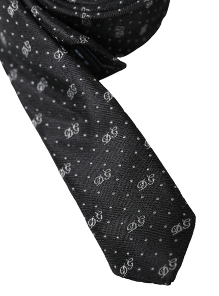 Close-up of Dolce & Gabbana black silk tie with DG logo