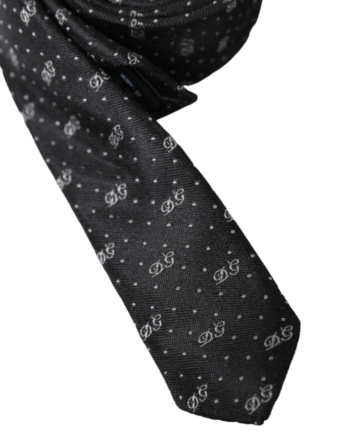 Close-up of Dolce & Gabbana black silk tie with DG logo