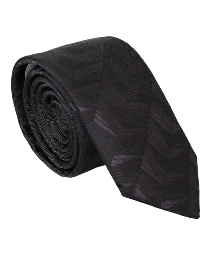 Dolce & Gabbana black patterned silk tie rolled