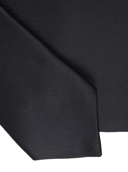 Close-up of black silk tie fabric