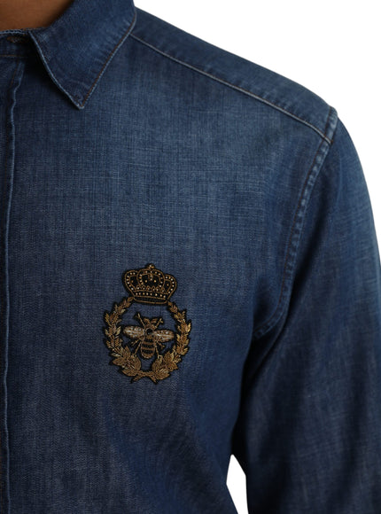 Close-up of crown bee emblem on Dolce & Gabbana denim shirt.