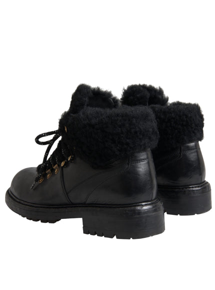 Back view of Dolce & Gabbana black leather shearling boots