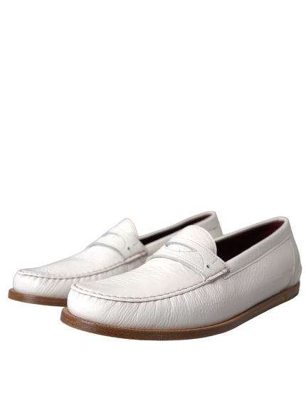 Angled view of Dolce & Gabbana white leather loafers