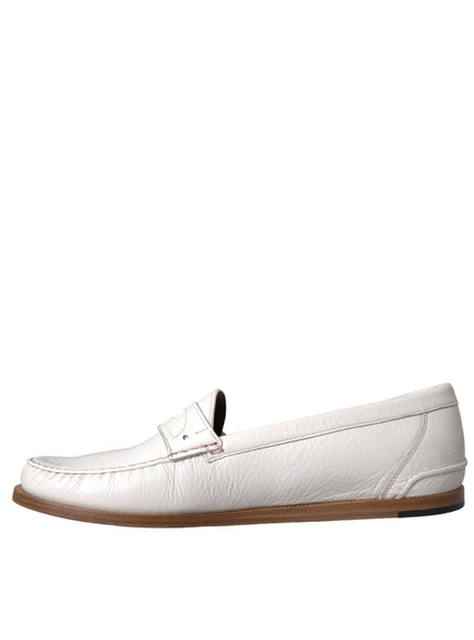 Left side view of Dolce & Gabbana white leather loafers