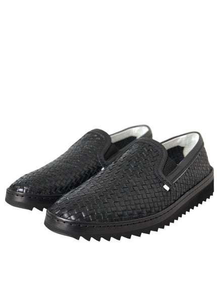 Angled view of Dolce & Gabbana black woven leather loafers