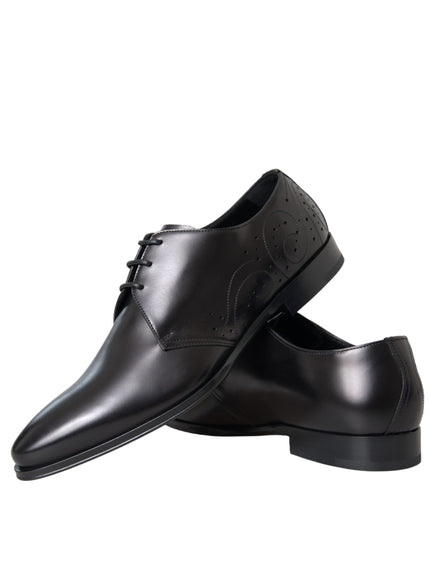 Pair of Dolce & Gabbana black leather Derby shoes