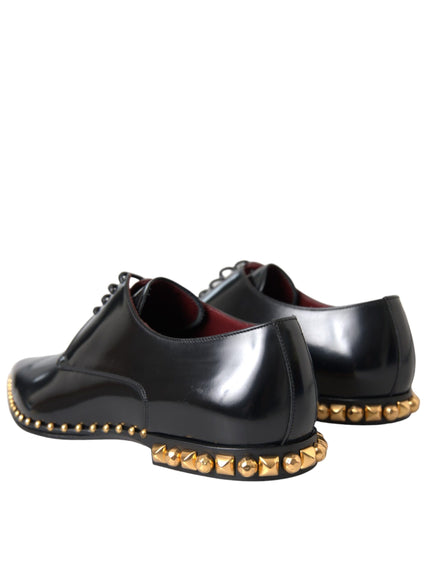 Back view of Dolce & Gabbana black leather shoes with gold studs