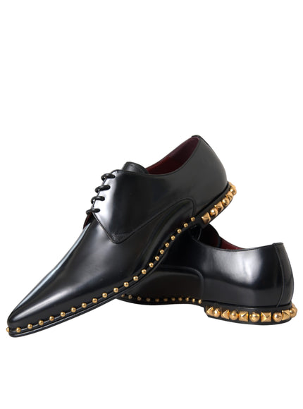 Pair of Dolce & Gabbana black leather shoes with gold studs