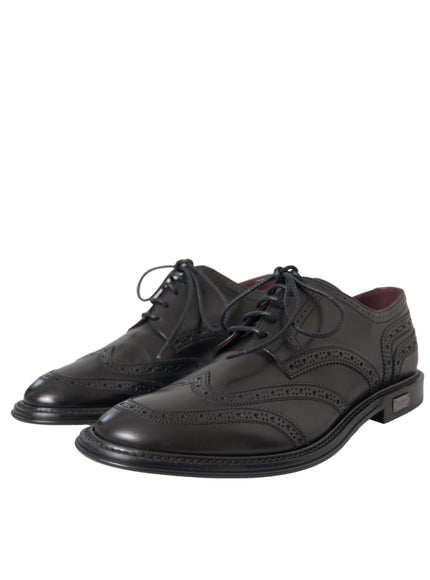 Angled view of Dolce & Gabbana black leather oxford wingtips