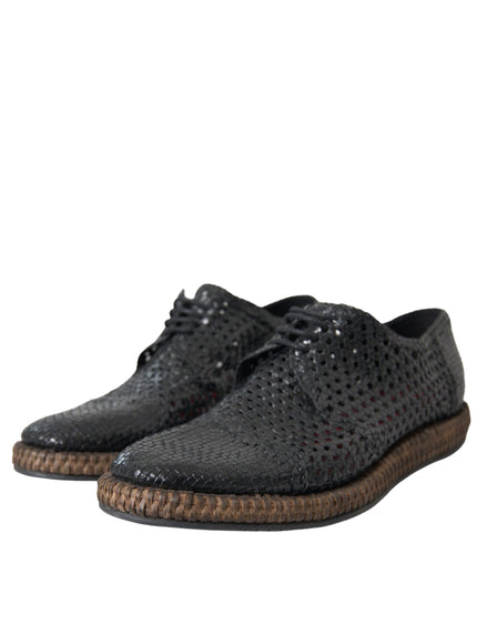 Angled view of Dolce & Gabbana black woven leather derby shoes