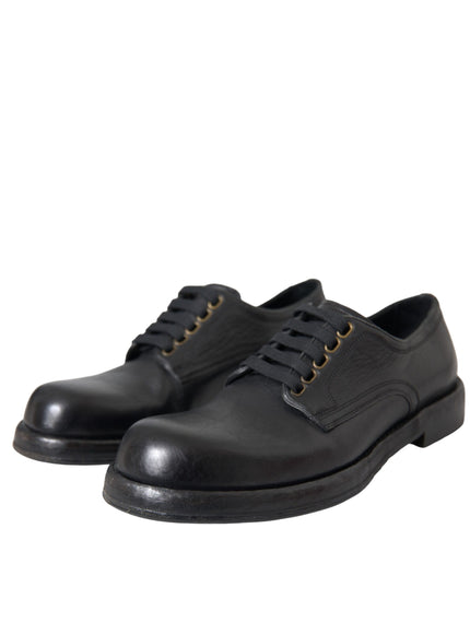 Angled view of Dolce & Gabbana black leather derby shoes