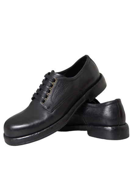 Pair of Dolce & Gabbana black leather derby shoes