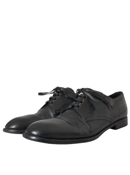 Angled view of Dolce & Gabbana black leather derby shoes