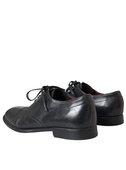 Back view of Dolce & Gabbana black leather derby shoes