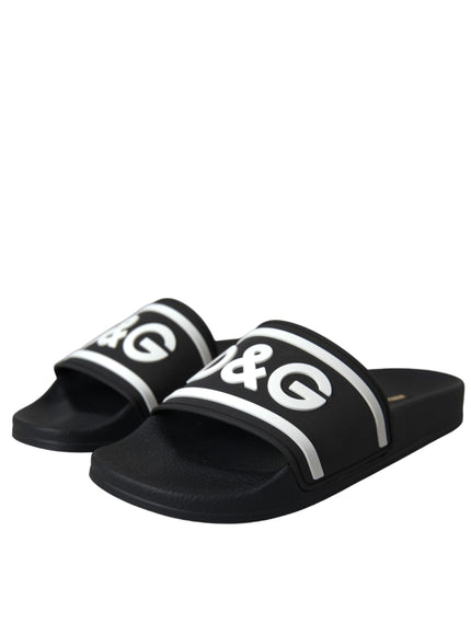 Dolce & Gabbana black slides with white logo, angled view