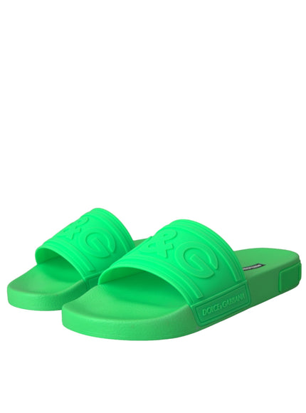 Angled view of Dolce & Gabbana green leather slides