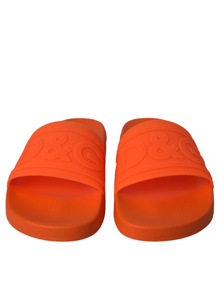 Front view of Dolce & Gabbana orange rubber slides