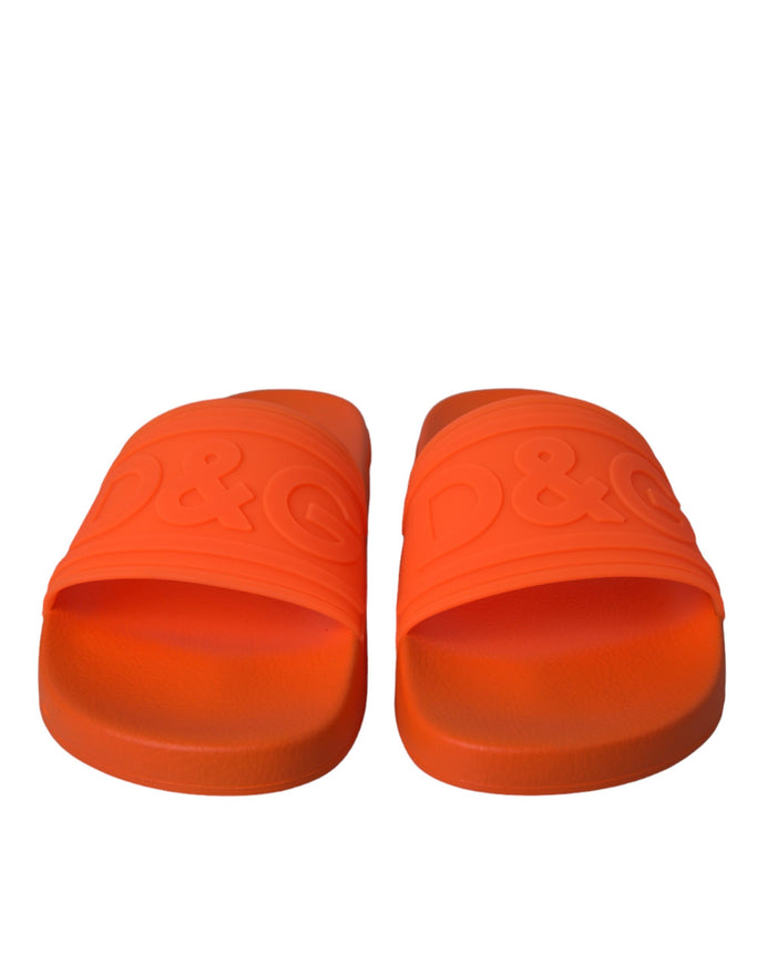 Front view of Dolce & Gabbana orange rubber slides