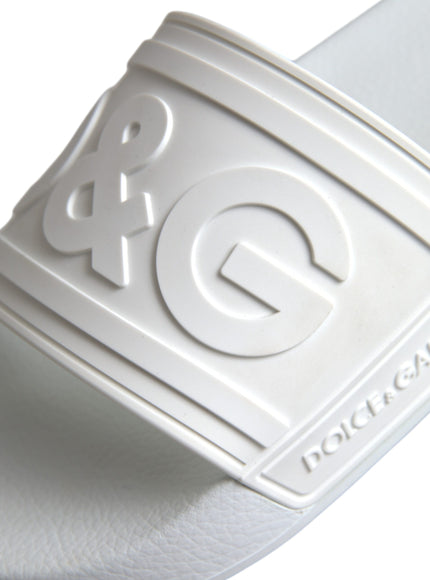 Close-up of Dolce & Gabbana logo on white rubber slides