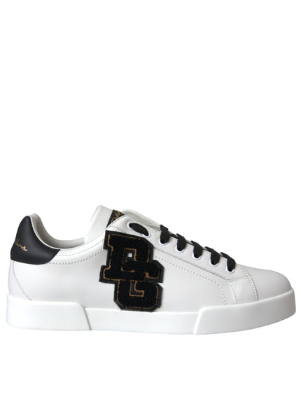 a white sneaker with a black and gold logo