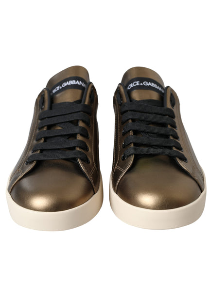 Front view of Dolce & Gabbana gold black leather sneakers