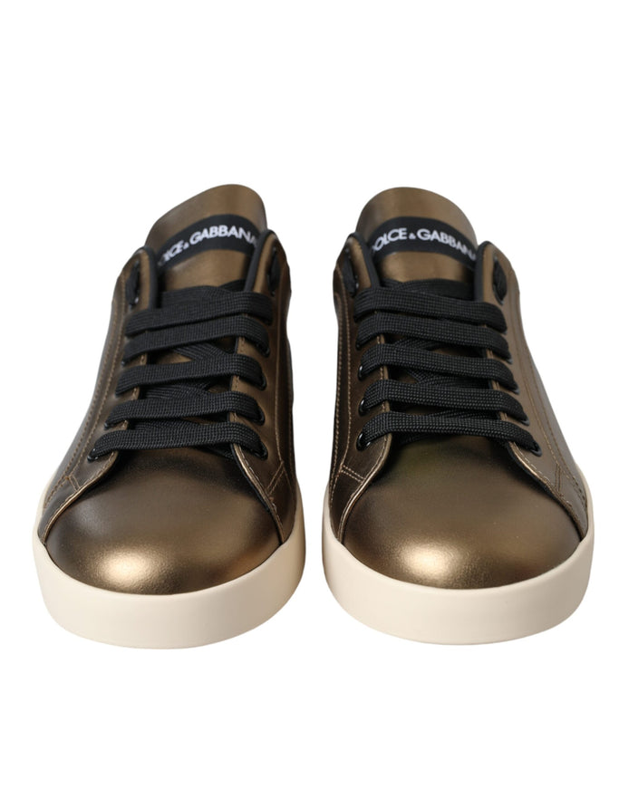 Front view of Dolce & Gabbana gold black leather sneakers