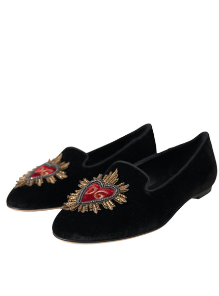 Angled view of black velvet DG heart loafers