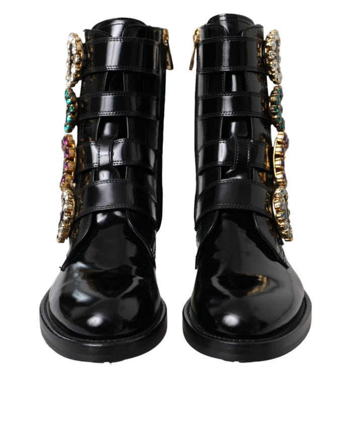 Front view of black leather boots with crystal buckles