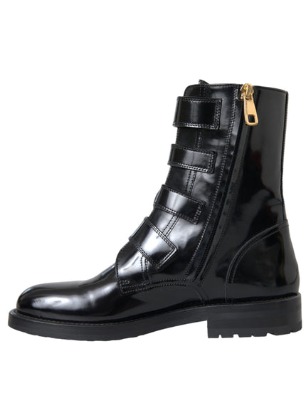 Side view of black leather boots with zipper detail