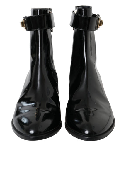 Front view of Dolce & Gabbana black leather ankle boots