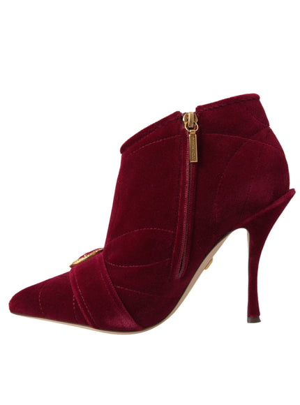 Side zipper view of Dolce & Gabbana red velvet boots