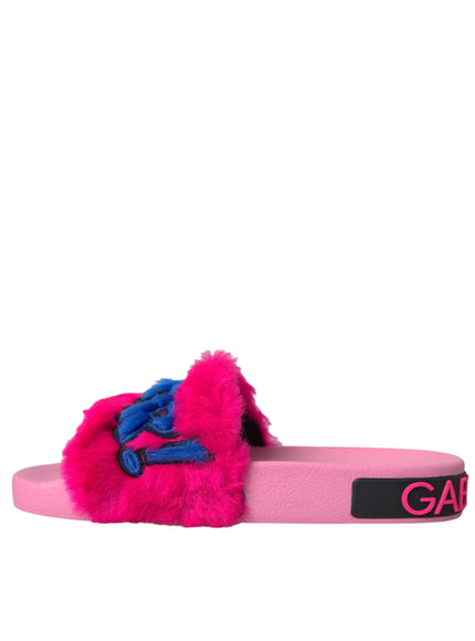 a pink slipper with a blue bow on it