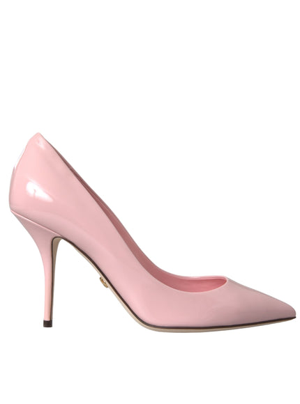 a pink high heeled shoe on a white background