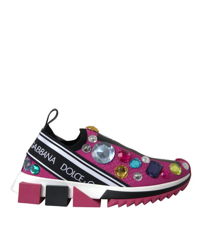 a pink sneaker with multi colored stones on the side