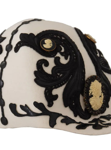 Side view of embroidered Dolce & Gabbana hat with cameo brooch