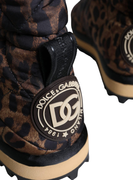 Close-up of Dolce & Gabbana logo on leopard boots