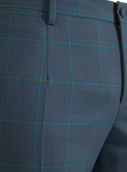 Close-up of blue checkered pattern on wool dress pants