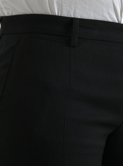 Close-up of Dolce & Gabbana black wool pants texture