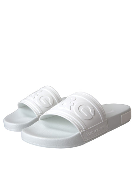 a pair of white slippers on a white background