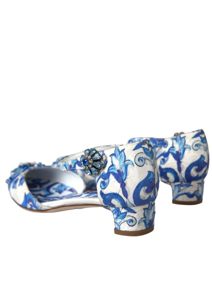 a pair of blue and white shoes on a white background