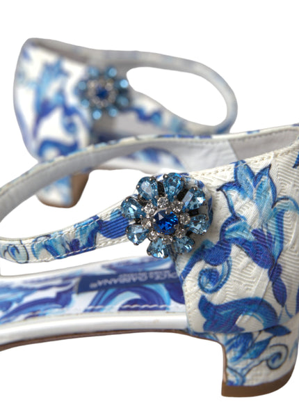 a blue and white shoe with a flower on it