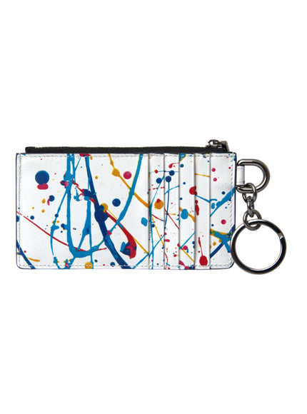 a white wallet with a multicolored paint splattered design