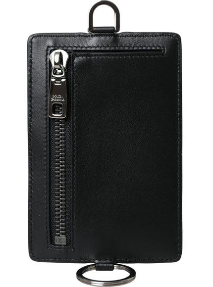 a black wallet with a metal ring on it