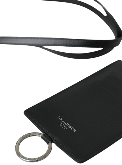 a black card holder with a key chain