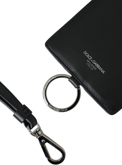 a black wallet with a key chain and a black key ring