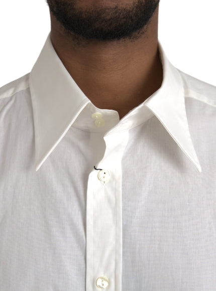 a close up of a man wearing a white shirt